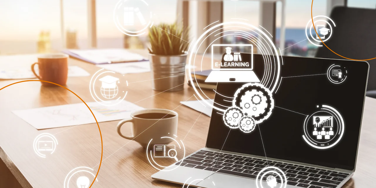 A laptop that reads "e-learning" with many spokes