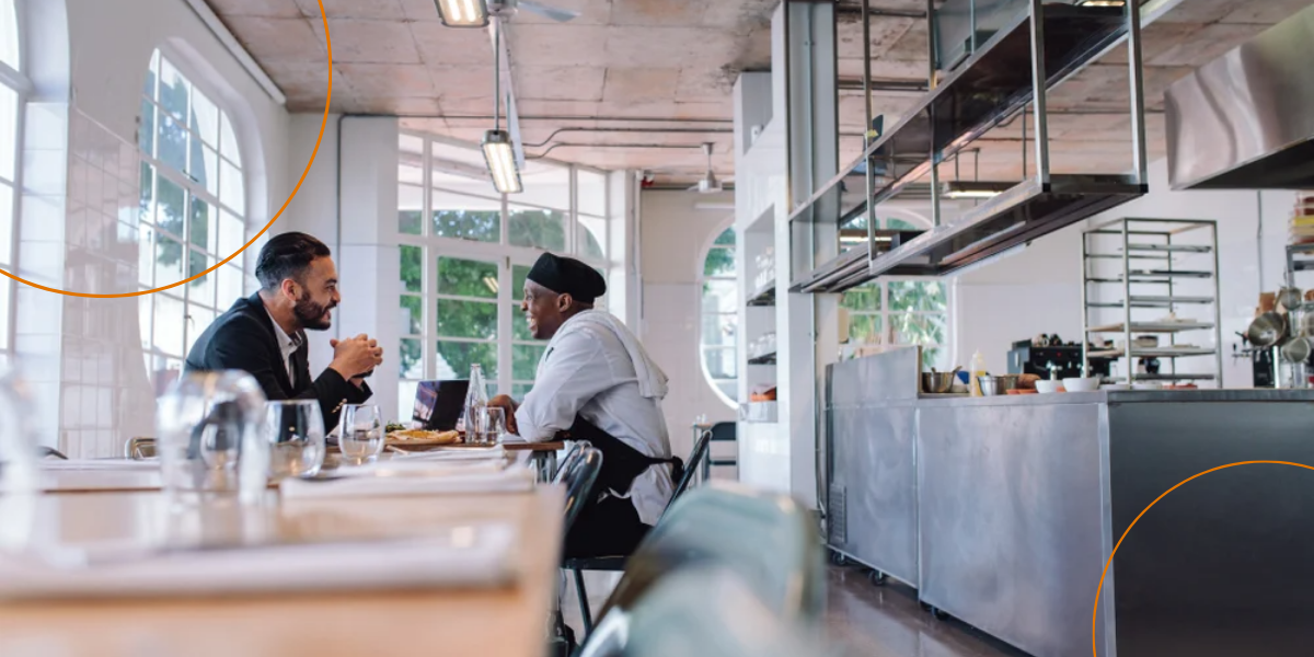 A field agent visits a restaurant and talks to the head chef